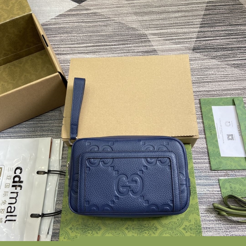 G*u*i clutch bags